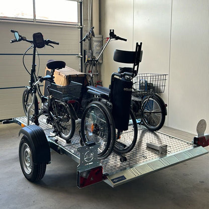 TREILER® 750 braked, lowerable and foldable motorcycle trailers